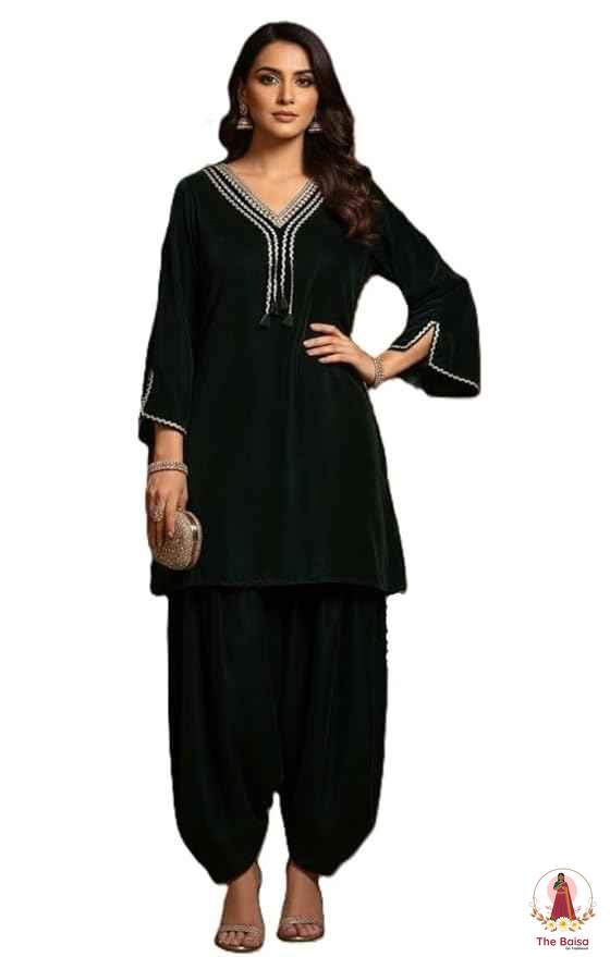 Model wearing a velvet kurta and dhoti salwar festive set